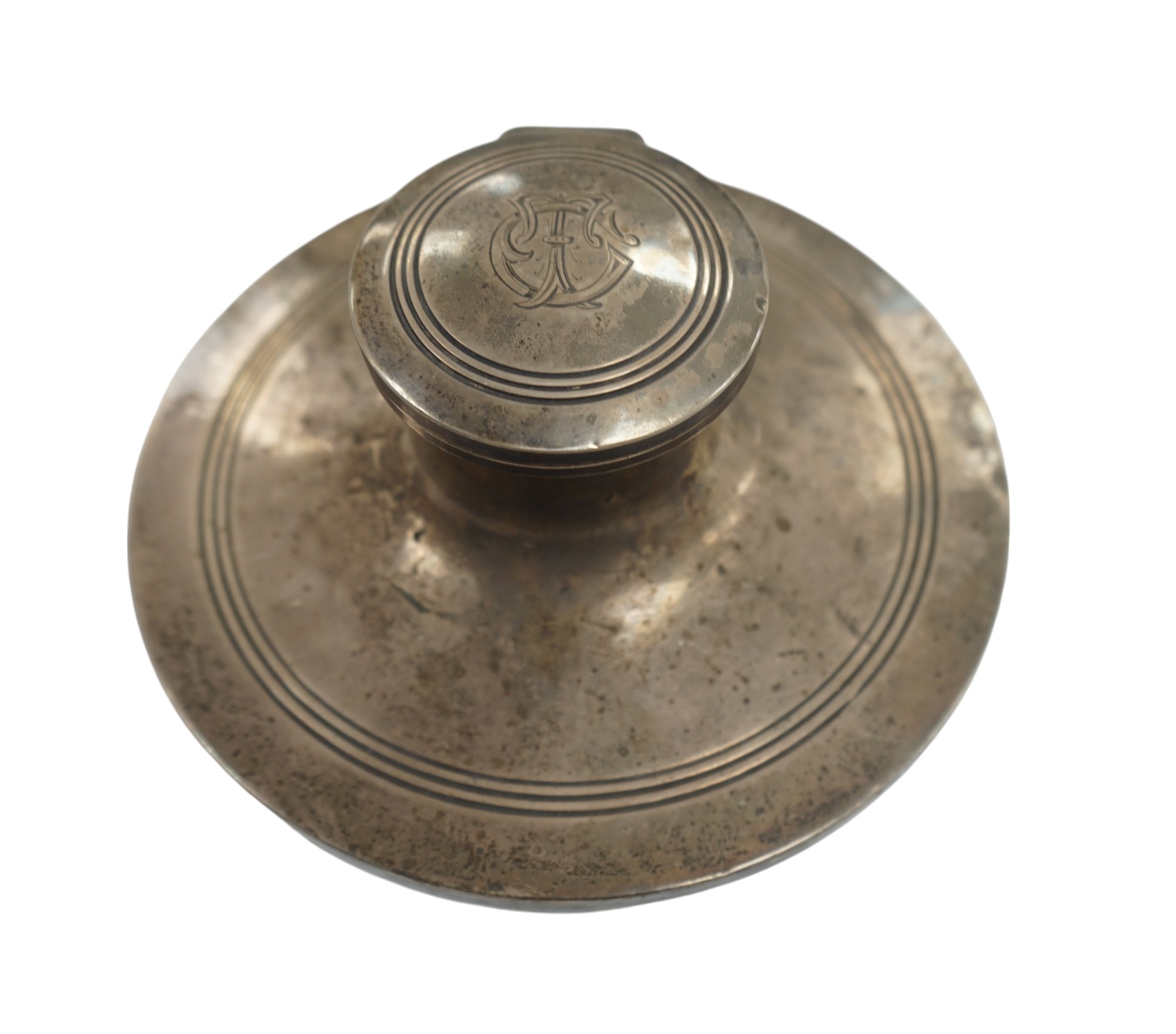 A George V silver mounted capstan inkwell, Birmingham, 1910, base diameter 15.2cm. Condition - poor to fair